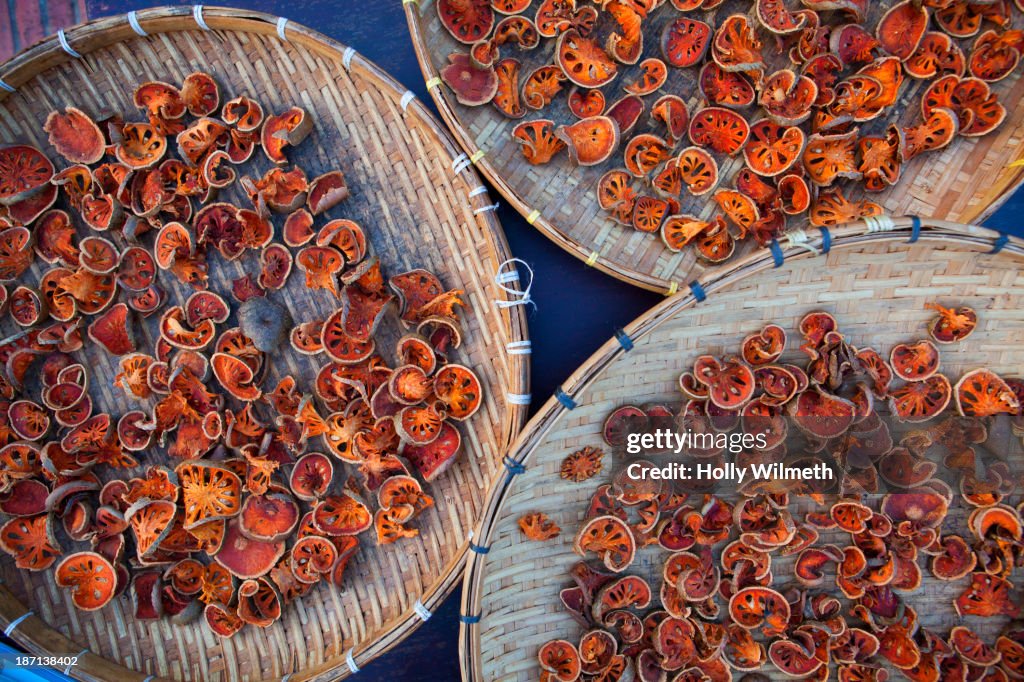 Baskets of drying fruit