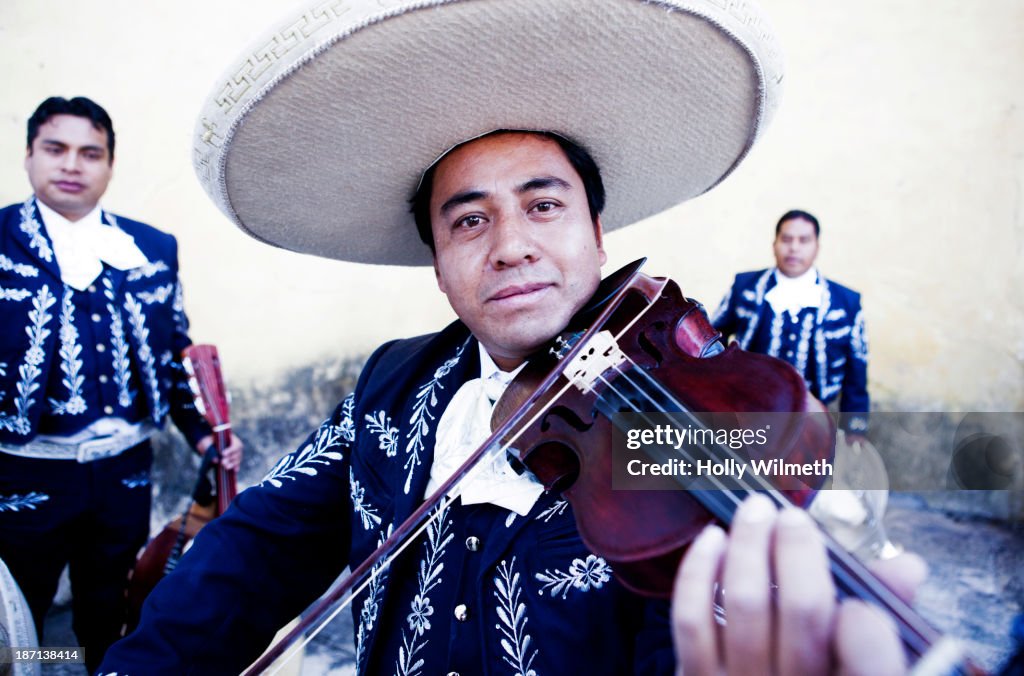 Hispanic mariachi band playing outdoors