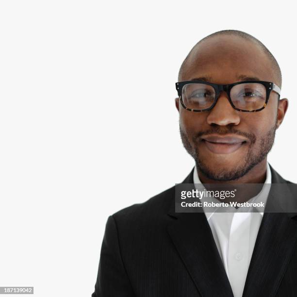 black businessman smiling - black suit close up stock pictures, royalty-free photos & images