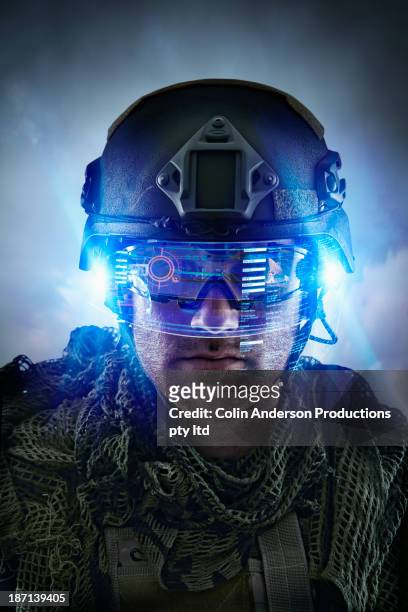 caucasian soldier wearing helmet - army helmet stockfoto's en -beelden
