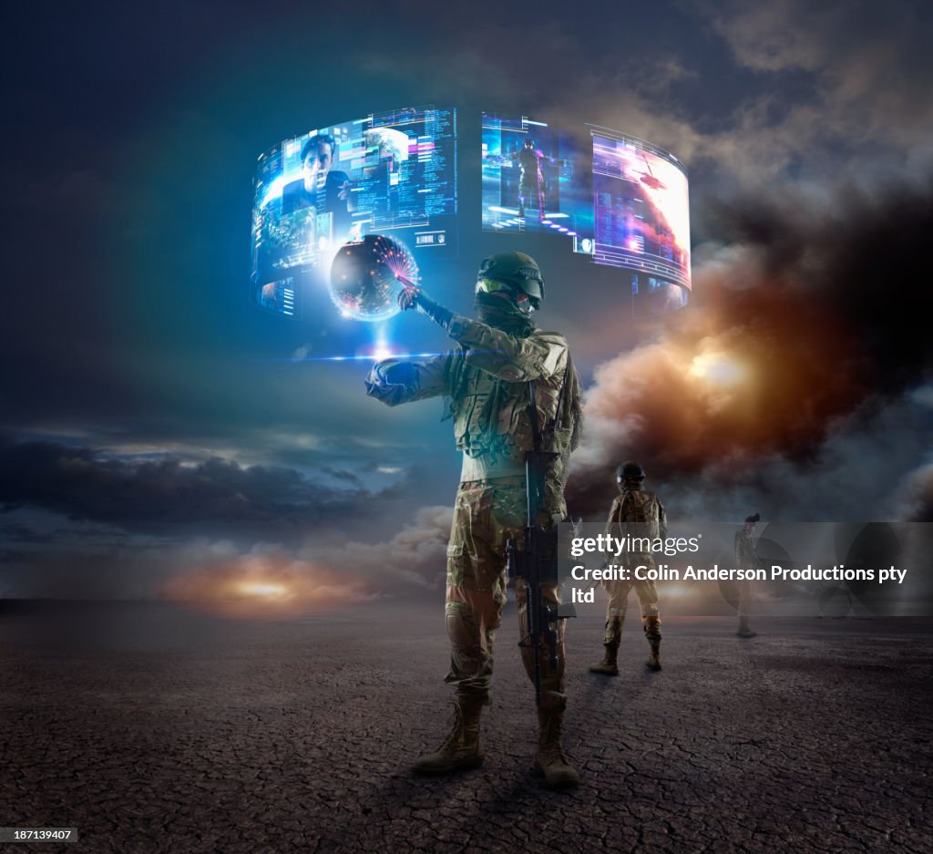 Caucasian soldier using holographs in combat zone