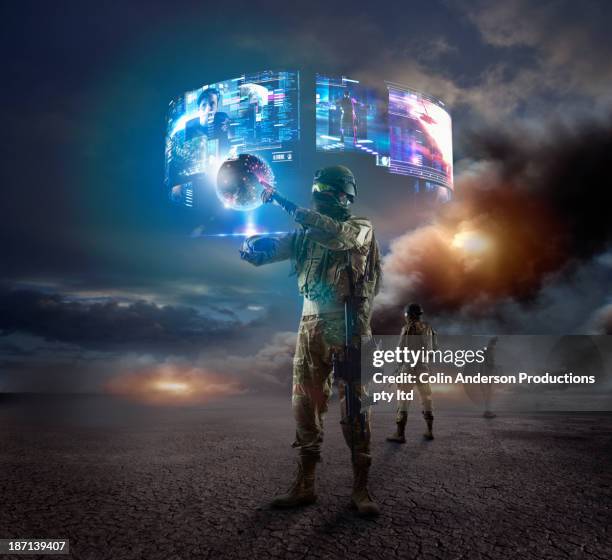 caucasian soldier using holographs in combat zone - soldado do exercito imagens e fotografias de stock