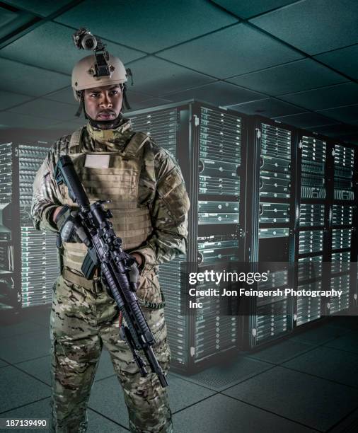 african american soldier in server room - attitude army stock pictures, royalty-free photos & images