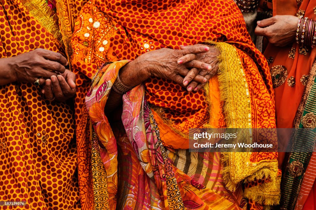 Women wearing traditional Indian clothing at festival, Allahbad, Uttar Pradesh, India