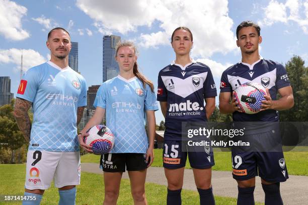 Jamie Maclaren of Melbourne City, Emina Ekic of Melbourne City, Emma Checker of Melbourne Victory and Daniel Arzani of Melbourne Victory pose for a...