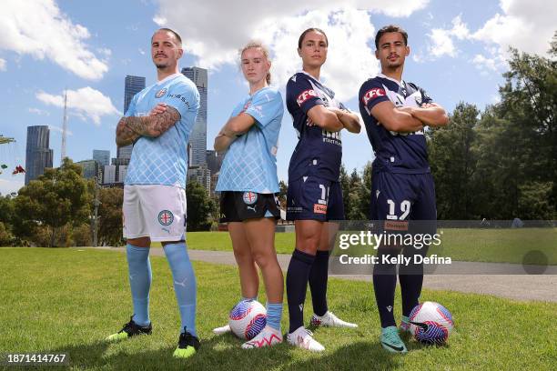 Jamie Maclaren of Melbourne City, Emina Ekic of Melbourne City, Emma Checker of Melbourne Victory and Daniel Arzani of Melbourne Victory pose for a...