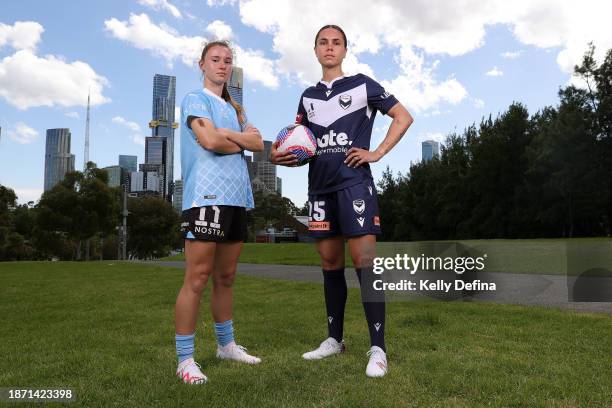 Emina Ekic of Melbourne City and Emma Checker of Melbourne Victory pose for a photo during an A-League media opportunity at Federation Square on...