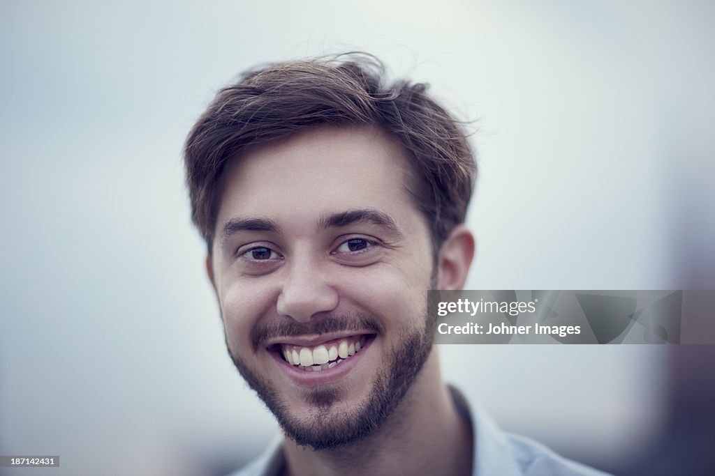 Portrait of smiling young man