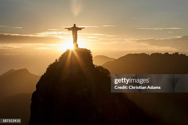 corcovado at sunset - cristo redentor stock pictures, royalty-free photos & images