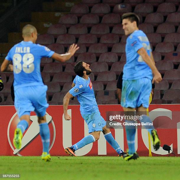 Gonzalo Higuain of Napoli celebrates after scoring their third goal during the UEFA Champions League Group F match between SSC Napoli and Olympique...