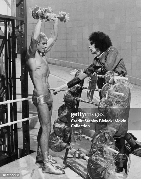 Actors Tim Curry and Peter Hinwood in a scene from the movie 'The Rocky Horror Picture Show', 1975.