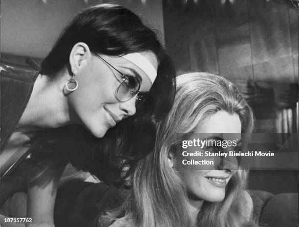 Actresses JoAnna Cameron and Joanna Barnes in a scene from the movie 'B. S. I Love You', 1971.