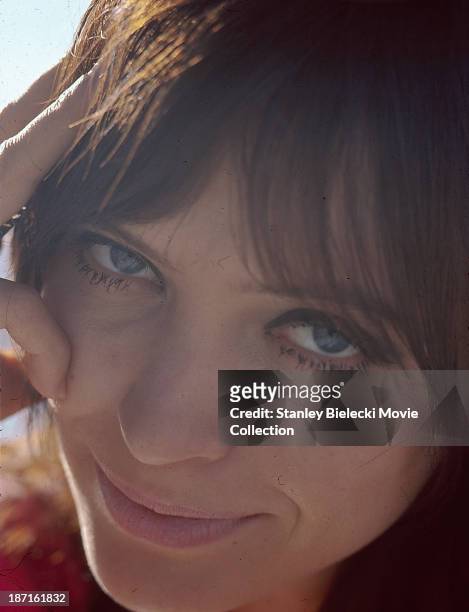 Promotional shot of actress Anna Karina, as she appears in the movie 'The Magus', 1968.