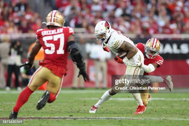 Running back James Conner of the Arizona Cardinals rushes the football against cornerback Charvarius Ward of the San Francisco 49ers during the NFL...