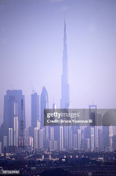 cityscape of dubai with burj khalifa - burj khalifa stock-fotos und bilder