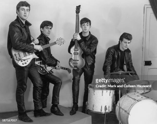 17th DECEMBER: The Beatles pose wearing leather jackets and trousers during their first professional photography session with local wedding...