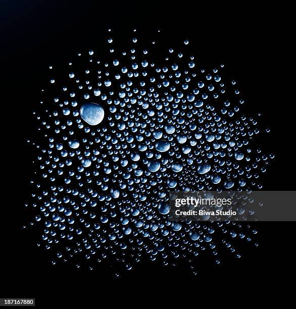 water droplets on black background - purity foto e immagini stock