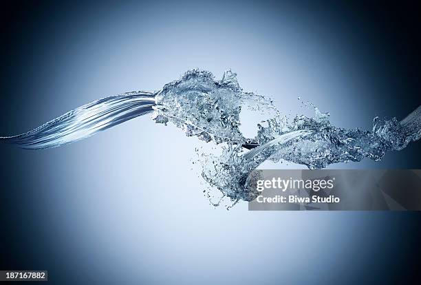 water splash collision in midair - splash stock pictures, royalty-free photos & images