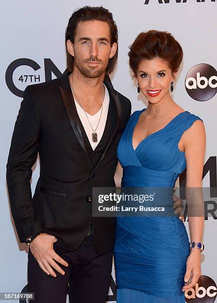 Jake Owen and wife Lacey Buchanan attend the 47th annual CMA Awards at the Bridgestone Arena on November 6, 2013 in Nashville, Tennessee.