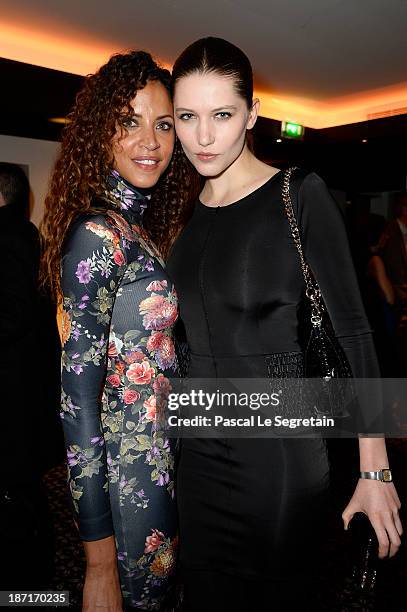 Noemie Lenoir and a guest attend the Opening of the TAG Heuer New Boutique, Followed By An Evening Celebrating 50 years of Carerra In Pavillon...
