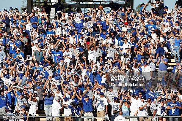 Fans of the Los Angeles Dodgers cheer during Game Five of the National League Championship Series against the St. Louis Cardinals October 16, 2013 at...