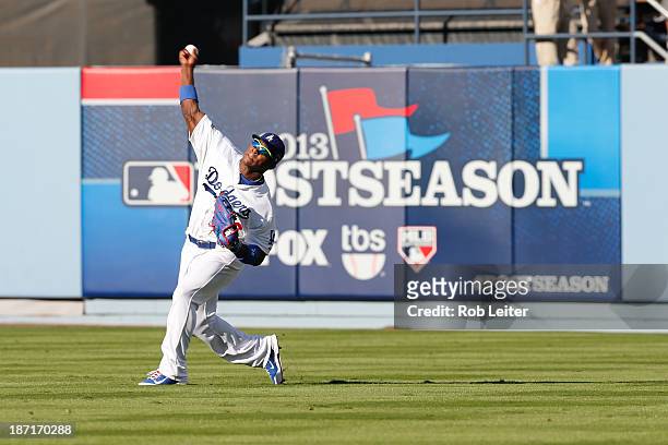 Yasiel Puig of the Los Angeles Dodgers throws the ball in from the outfield during Game Five of the National League Championship Series against the...