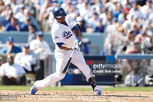 Juan Uribe of the Los Angeles Dodgers bats during Game Five of the National League Championship Series against the St. Louis Cardinals October 16,...