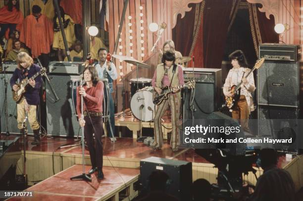 The Rolling Stones perform live on stage on the set of the Rolling Stones Rock and Roll Circus at Intertel TV Studio in Wembley, London on 11th...