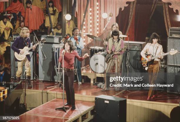 The Rolling Stones perform live on stage on the set of the Rolling Stones Rock and Roll Circus at Intertel TV Studio in Wembley, London on 11th...