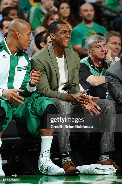 Keith Bogans and Rajon Rondo of the Boston Celtics chat on the bench during the game against the Utah Jazz on November 6, 2013 at the TD Garden in...
