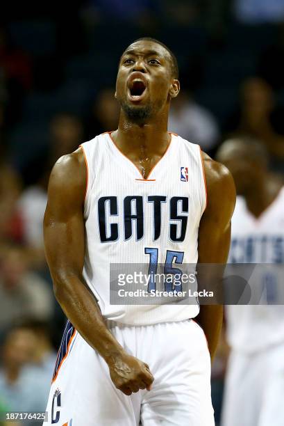 Kemba Walker of the Charlotte Bobcats reacts after a play during their game against the Toronto Raptors at Time Warner Cable Arena on November 6,...