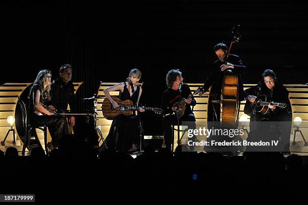 Alison Krauss, Eric Darken, Taylor Swift, Sam Bush, Edger Miller and Vince Gill perform during the 47th annual CMA awards at the Bridgestone Arena on...