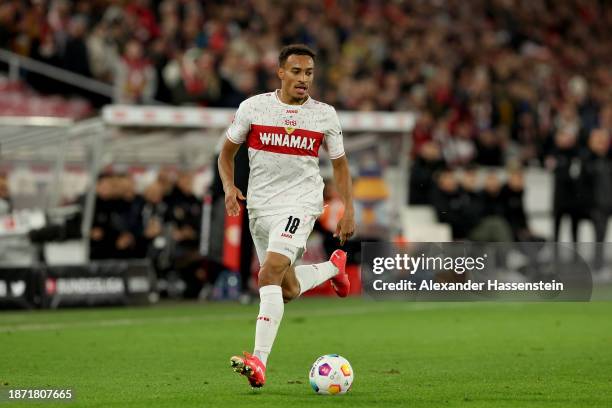 Jamie Leweling of VfB Stuttgart runs with the ball during the Bundesliga match between VfB Stuttgart and FC Augsburg at MHPArena on December 20, 2023...