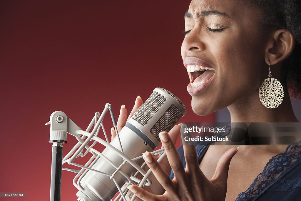 Female Singer Recording Vocals