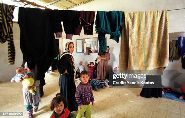 Palestinian family of 27 members resides in a modest two-room house in Jabalia refugee camp on December 16, 2001.