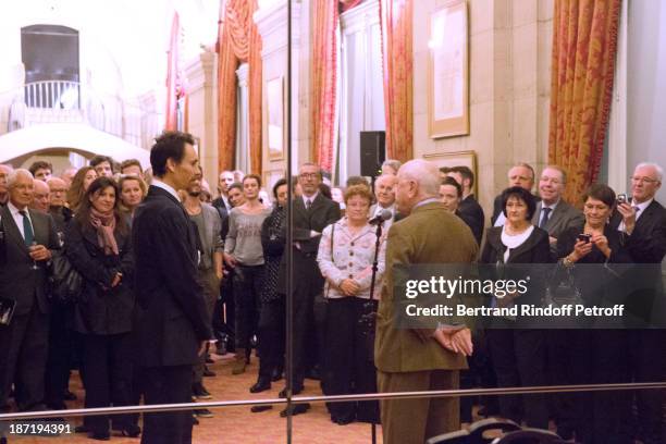 Star Dancer Nicolas le Riche receives the Insignia of Officer of the Legion of Honour from Pierre Berge , at Opera Garnier on November 6, 2013 in...