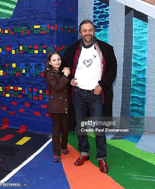 True Maria Fridrickh and artist Yanusz Gilewicz attend the CityArts & Disney "Celebrating The Heros Of Our City" Mural Ribbon Cutting at Henry M....