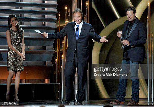 Producer Scott Hendricks and country music singer Blake Shelton accept award for Album of the Year onstage during the 47th annual CMA Awards at the...