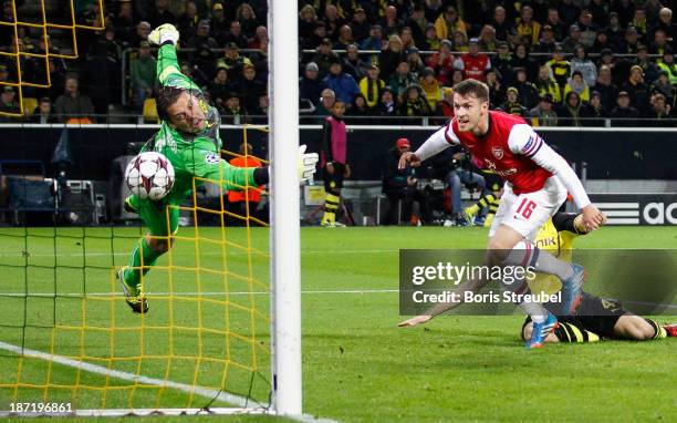 Aaron Ramsey of Arsenal scores his team's first goal during the UEFA Champions League Group F match between Borussia Dortmund and Arsenal at Signal...