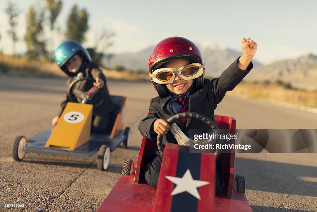 Young Business Boys Race Toy Cars