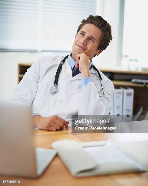 pleased with his patient's progress - peopleimages hospital stock pictures, royalty-free photos & images