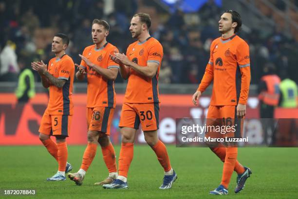 Stefano Sensi, Davide Frattesi, Carlos Augusto and Matteo Darmian of FC Internazionale acknowledge the fans after losing the Coppa Italia Round of 16...