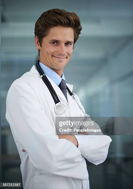 he's got a great bedside manner - peopleimages hospital stock pictures, royalty-free photos & images