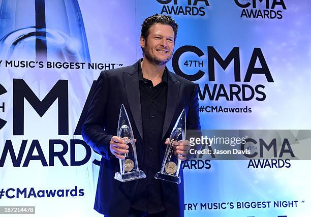 Album of the Year and Male Vocalist of the Year award winner Blake Shelton poses in the press room during the 47th Annual CMA Awards at the...