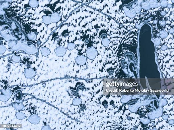 frozen snowy lake in winter, aerial view - land feature stock pictures, royalty-free photos & images