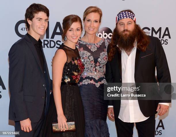 John Luke, Sadie, Korie and Willie Robertson of Duck Dynasty attend the 47th annual CMA Awards at the Bridgestone Arena on November 6, 2013 in...