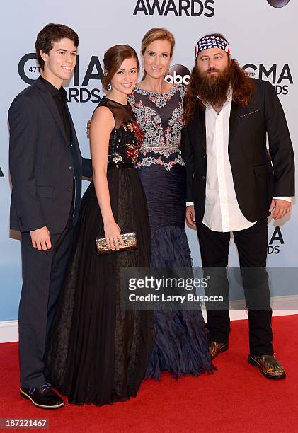 John Luke, Sadie, Korie and Willie Robertson of Duck Dynasty attend the 47th annual CMA Awards at the Bridgestone Arena on November 6, 2013 in...
