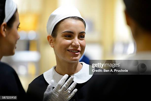 Models pose during a photocall to launch the Louis Vuitton Townhouse at Selfridges on November 7, 2013 in London, England. The first Louis Vuitton...