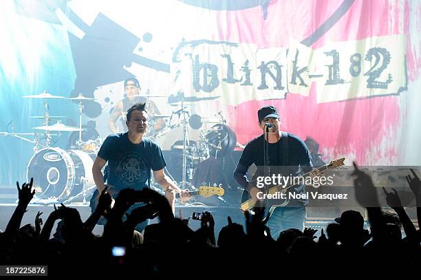 Travis Barker, Mark Hoppus and Tom DeLonge of blink - 182 perform at Hollywood Palladium on November 6, 2013 in Hollywood, California.