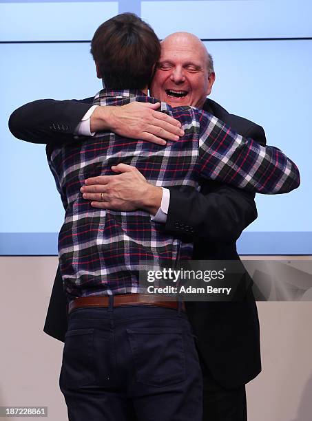 Microsoft Chief Executive Steve Ballmer hugs Joschka Friedag, co-founder of startup Cringle, beneficiary of the Microsoft Ventures program, as they...